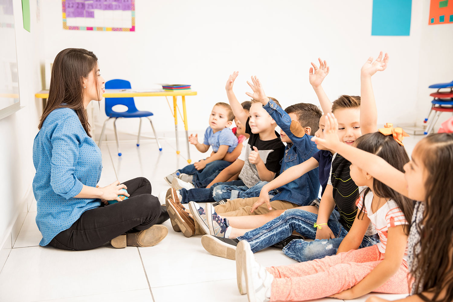 Tearcher helping with preschool classroom management